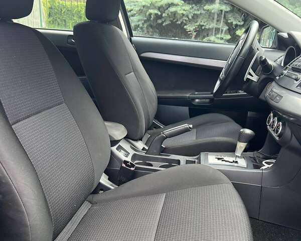 Бежевый Мицубиси Лансер, объемом двигателя 2 л и пробегом 163 тыс. км за 7000 $, фото 5 на Automoto.ua