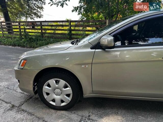 Бежевый Мицубиси Лансер, объемом двигателя 1.5 л и пробегом 192 тыс. км за 6690 $, фото 5 на Automoto.ua