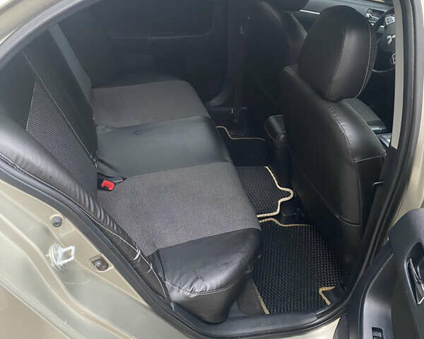 Бежевий Міцубісі Lancer, об'ємом двигуна 2 л та пробігом 173 тис. км за 7500 $, фото 4 на Automoto.ua