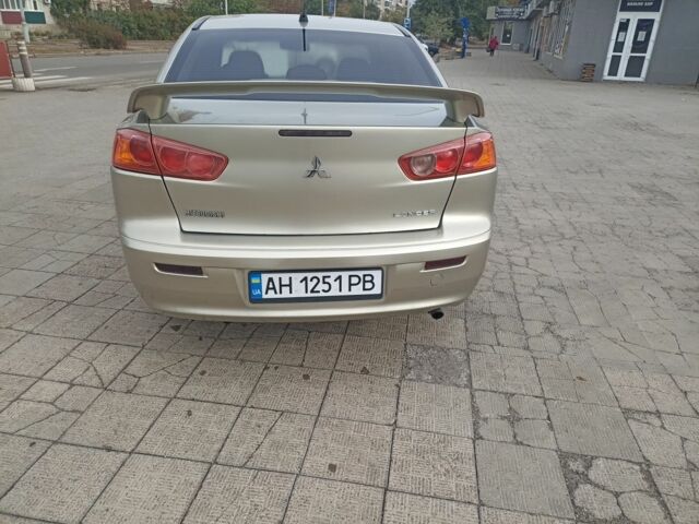 Бежевий Міцубісі Lancer, об'ємом двигуна 2 л та пробігом 340 тис. км за 5700 $, фото 2 на Automoto.ua