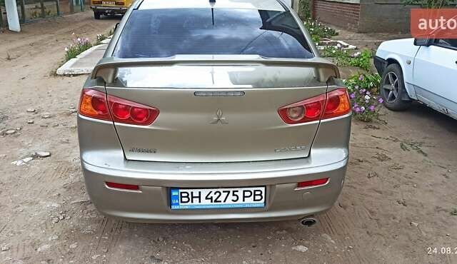 Бежевый Мицубиси Лансер, объемом двигателя 2 л и пробегом 235 тыс. км за 7200 $, фото 1 на Automoto.ua