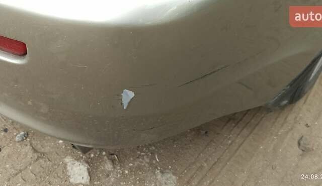 Бежевый Мицубиси Лансер, объемом двигателя 2 л и пробегом 235 тыс. км за 7200 $, фото 13 на Automoto.ua