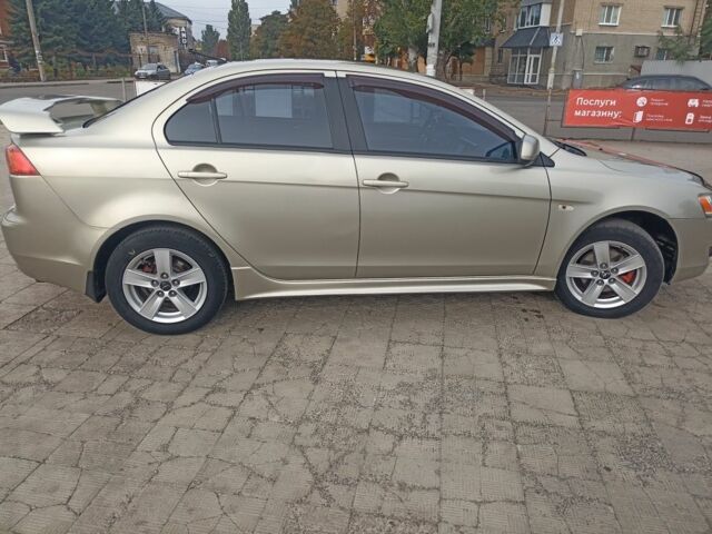 Бежевий Міцубісі Lancer, об'ємом двигуна 2 л та пробігом 340 тис. км за 5700 $, фото 1 на Automoto.ua
