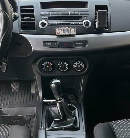 Мицубиси Лансер 2008 в Киеве на Automoto.ua Бежевый Мицубиси Лансер, объемом двигателя 1.5 л и пробегом 224 тыс. км за 5400 $, фото 12 на Automoto.ua