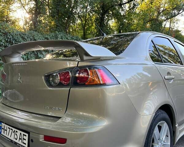 Бежевый Мицубиси Лансер, объемом двигателя 2 л и пробегом 146 тыс. км за 7750 $, фото 4 на Automoto.ua