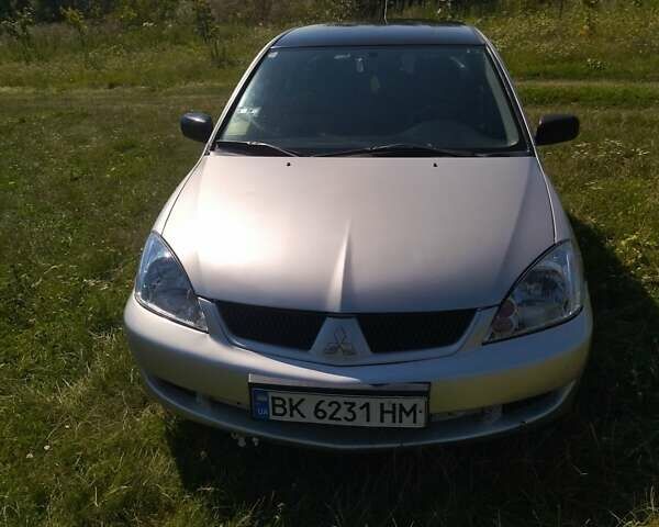 Бежевий Міцубісі Lancer, об'ємом двигуна 1.6 л та пробігом 200 тис. км за 3700 $, фото 2 на Automoto.ua