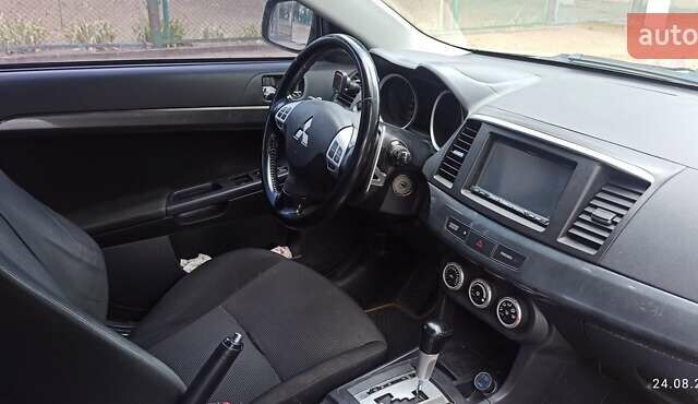 Бежевый Мицубиси Лансер, объемом двигателя 2 л и пробегом 235 тыс. км за 7200 $, фото 11 на Automoto.ua