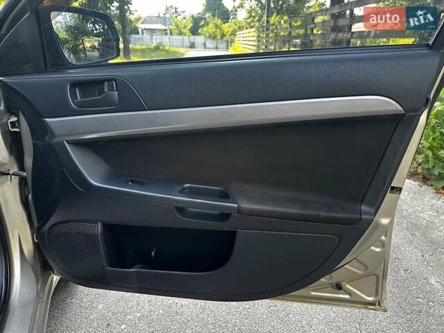 Бежевый Мицубиси Лансер, объемом двигателя 1.5 л и пробегом 192 тыс. км за 6690 $, фото 20 на Automoto.ua