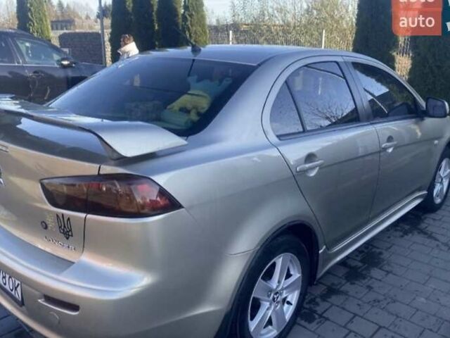 Бежевый Мицубиси Лансер, объемом двигателя 2 л и пробегом 220 тыс. км за 7300 $, фото 5 на Automoto.ua