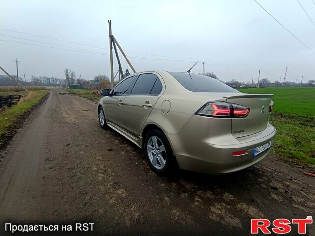 Бежевый Мицубиси Лансер, объемом двигателя 2 л и пробегом 160 тыс. км за 6500 $, фото 3 на Automoto.ua