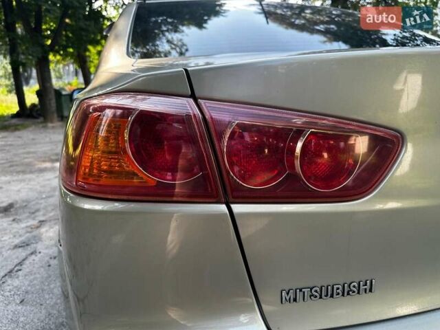 Бежевый Мицубиси Лансер, объемом двигателя 1.5 л и пробегом 192 тыс. км за 6690 $, фото 4 на Automoto.ua