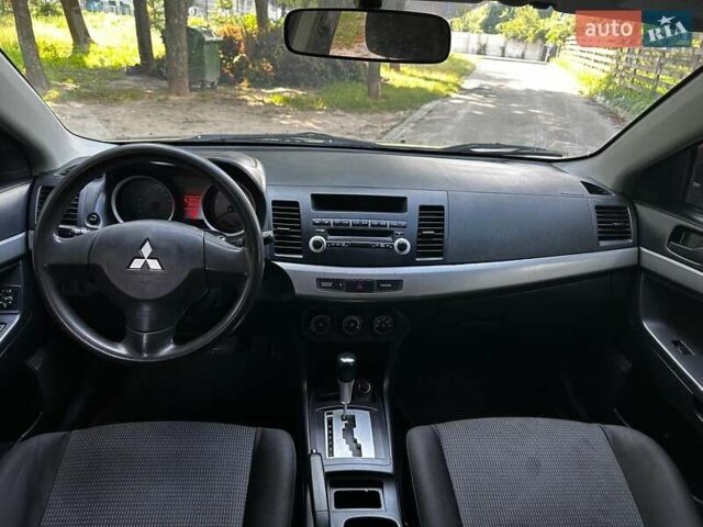 Бежевый Мицубиси Лансер, объемом двигателя 1.5 л и пробегом 192 тыс. км за 6690 $, фото 17 на Automoto.ua