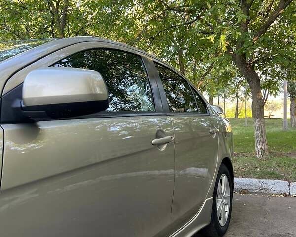 Бежевый Мицубиси Лансер, объемом двигателя 2 л и пробегом 146 тыс. км за 7750 $, фото 2 на Automoto.ua