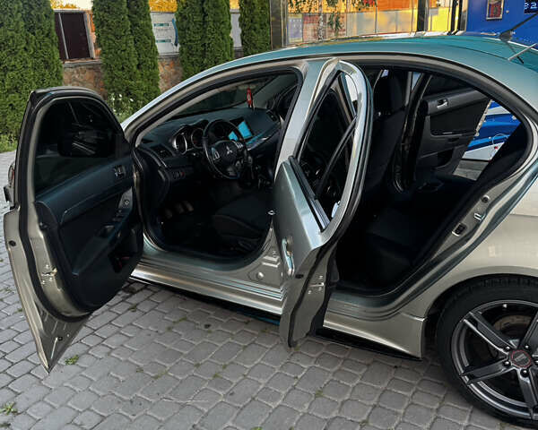 Бежевый Мицубиси Лансер, объемом двигателя 2 л и пробегом 225 тыс. км за 6999 $, фото 20 на Automoto.ua