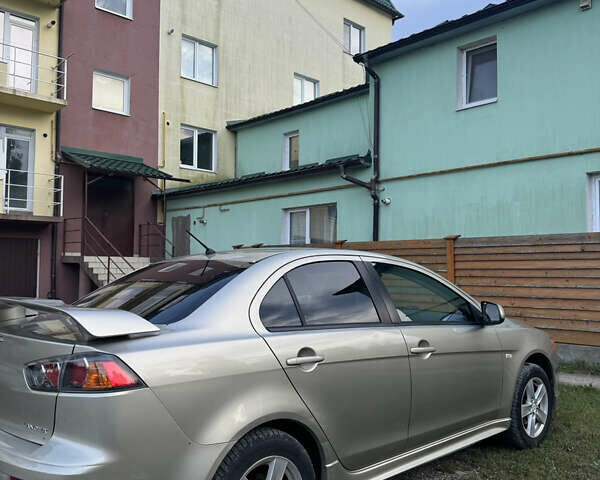 Бежевый Мицубиси Лансер, объемом двигателя 2 л и пробегом 240 тыс. км за 6500 $, фото 7 на Automoto.ua