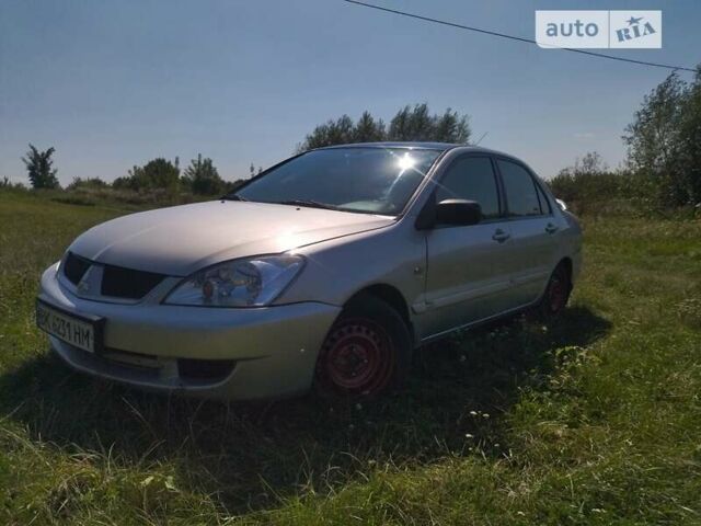 Бежевий Міцубісі Lancer, об'ємом двигуна 1.6 л та пробігом 200 тис. км за 3700 $, фото 3 на Automoto.ua