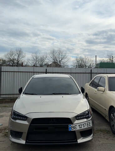 Бежевый Мицубиси Лансер, объемом двигателя 2 л и пробегом 225 тыс. км за 6999 $, фото 2 на Automoto.ua