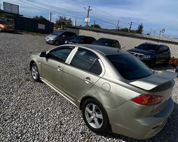 Бежевий Міцубісі Lancer, об'ємом двигуна 2 л та пробігом 250 тис. км за 5500 $, фото 8 на Automoto.ua