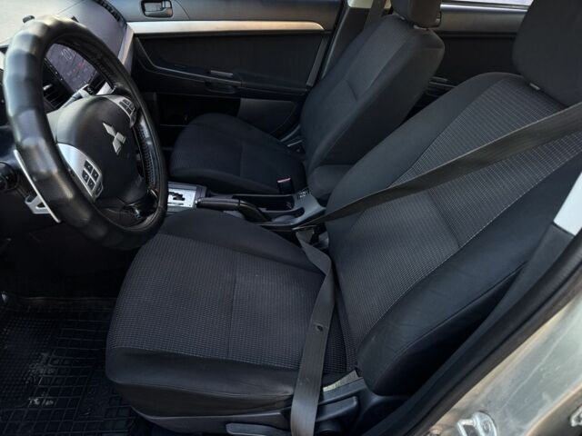 Бежевий Міцубісі Lancer, об'ємом двигуна 2 л та пробігом 240 тис. км за 4300 $, фото 7 на Automoto.ua