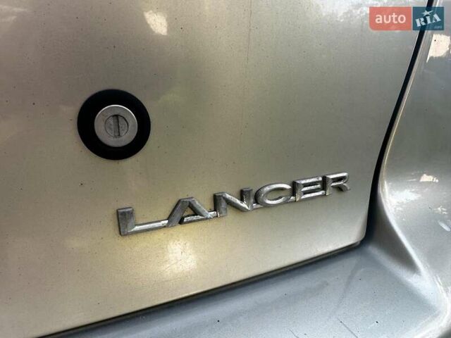 Бежевый Мицубиси Лансер, объемом двигателя 1.5 л и пробегом 192 тыс. км за 6690 $, фото 3 на Automoto.ua