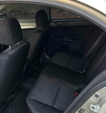 Мицубиси Лансер 2008 в Киеве на Automoto.ua Бежевый Мицубиси Лансер, объемом двигателя 1.5 л и пробегом 224 тыс. км за 5400 $, фото 10 на Automoto.ua