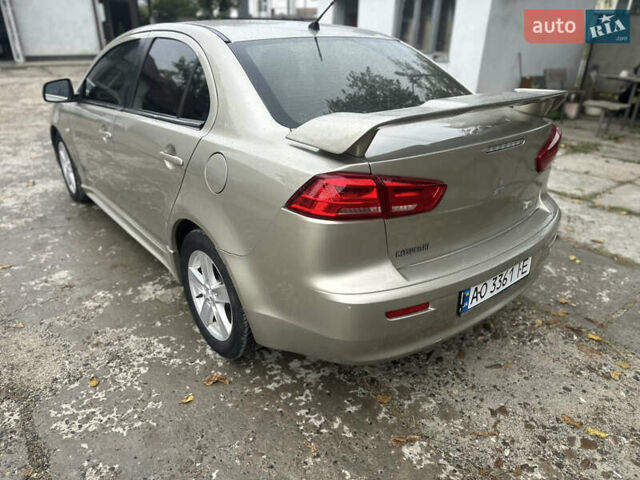 Бежевий Міцубісі Lancer, об'ємом двигуна 2 л та пробігом 312 тис. км за 4700 $, фото 6 на Automoto.ua