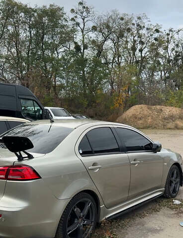 Бежевый Мицубиси Лансер, объемом двигателя 2 л и пробегом 225 тыс. км за 6999 $, фото 7 на Automoto.ua