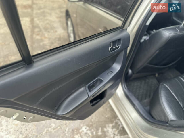 Бежевий Міцубісі Lancer, об'ємом двигуна 2 л та пробігом 312 тис. км за 4700 $, фото 8 на Automoto.ua