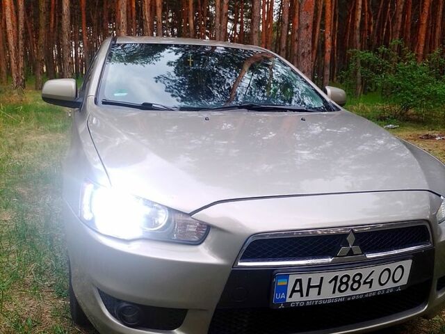 Бежевий Міцубісі Lancer, об'ємом двигуна 2 л та пробігом 164 тис. км за 6500 $, фото 2 на Automoto.ua