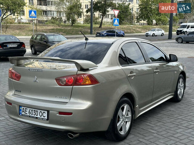 Бежевый Мицубиси Лансер, объемом двигателя 2 л и пробегом 172 тыс. км за 6800 $, фото 3 на Automoto.ua
