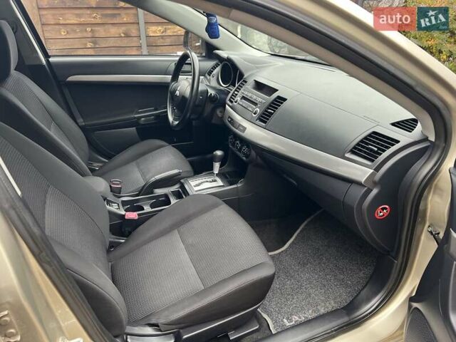 Бежевый Мицубиси Лансер, объемом двигателя 1.5 л и пробегом 230 тыс. км за 5950 $, фото 11 на Automoto.ua