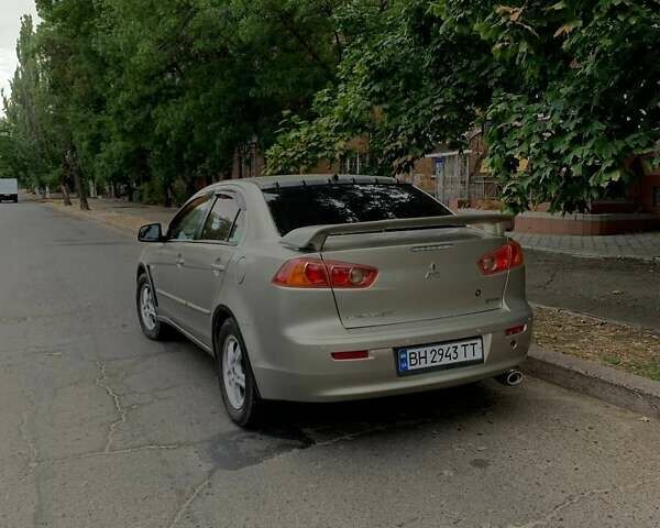 Бежевий Міцубісі Lancer, об'ємом двигуна 2 л та пробігом 212 тис. км за 6300 $, фото 2 на Automoto.ua