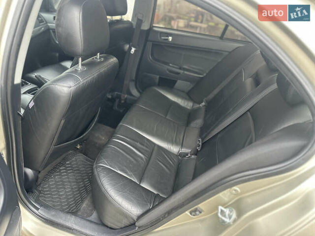 Бежевий Міцубісі Lancer, об'ємом двигуна 2 л та пробігом 312 тис. км за 4700 $, фото 9 на Automoto.ua
