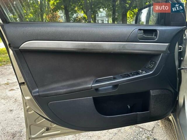 Бежевый Мицубиси Лансер, объемом двигателя 1.5 л и пробегом 192 тыс. км за 6690 $, фото 6 на Automoto.ua