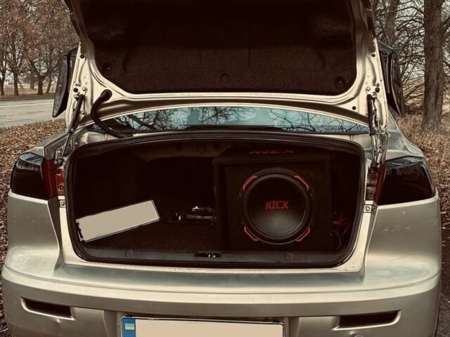 Бежевый Мицубиси Лансер, объемом двигателя 1.5 л и пробегом 250 тыс. км за 6000 $, фото 13 на Automoto.ua