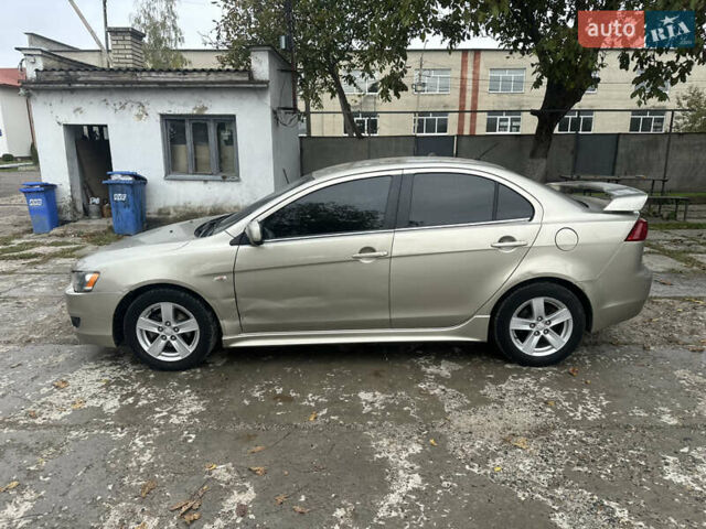 Бежевий Міцубісі Lancer, об'ємом двигуна 2 л та пробігом 312 тис. км за 4700 $, фото 4 на Automoto.ua