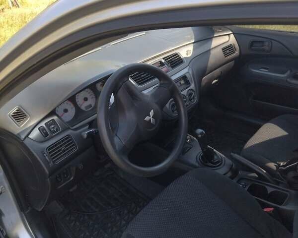 Бежевий Міцубісі Lancer, об'ємом двигуна 1.6 л та пробігом 200 тис. км за 3700 $, фото 8 на Automoto.ua