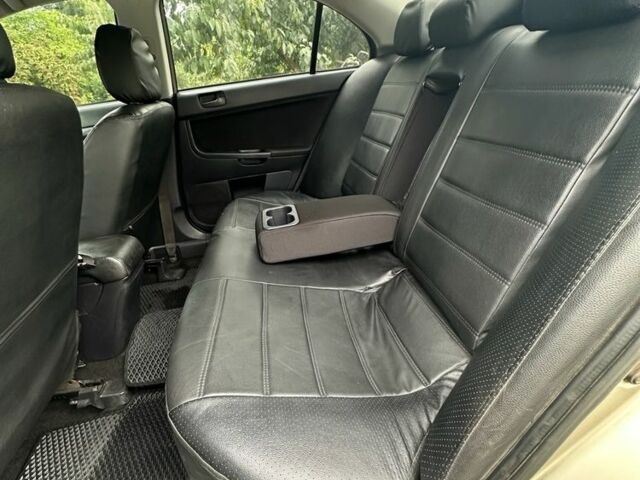 Бежевый Мицубиси Лансер, объемом двигателя 1.5 л и пробегом 250 тыс. км за 6000 $, фото 7 на Automoto.ua