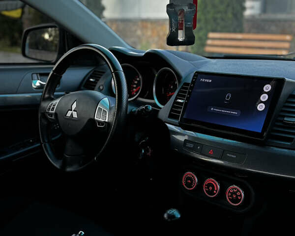 Бежевый Мицубиси Лансер, объемом двигателя 2 л и пробегом 225 тыс. км за 6999 $, фото 10 на Automoto.ua