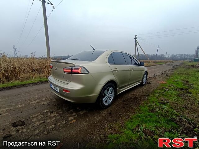 Бежевый Мицубиси Лансер, объемом двигателя 2 л и пробегом 160 тыс. км за 6500 $, фото 2 на Automoto.ua