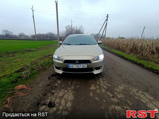 Бежевый Мицубиси Лансер, объемом двигателя 2 л и пробегом 160 тыс. км за 6500 $, фото 6 на Automoto.ua