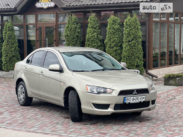 Бежевий Міцубісі Lancer, об'ємом двигуна 1.5 л та пробігом 160 тис. км за 4999 $, фото 11 на Automoto.ua