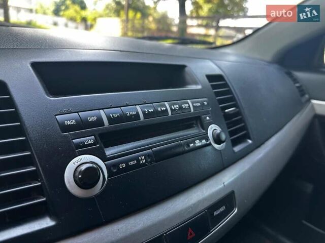 Бежевый Мицубиси Лансер, объемом двигателя 1.5 л и пробегом 192 тыс. км за 6690 $, фото 10 на Automoto.ua