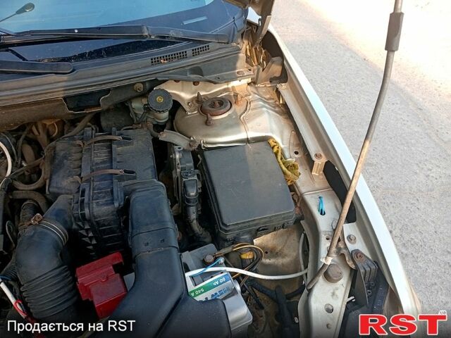 Бежевий Міцубісі Lancer, об'ємом двигуна 1.5 л та пробігом 200 тис. км за 3650 $, фото 7 на Automoto.ua