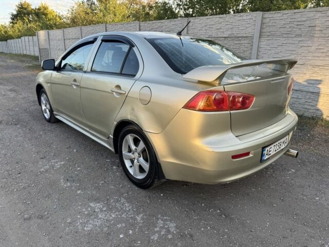 Бежевий Міцубісі Lancer, об'ємом двигуна 2 л та пробігом 240 тис. км за 4300 $, фото 4 на Automoto.ua