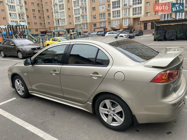 Бежевий Міцубісі Lancer, об'ємом двигуна 2 л та пробігом 173 тис. км за 7500 $, фото 8 на Automoto.ua