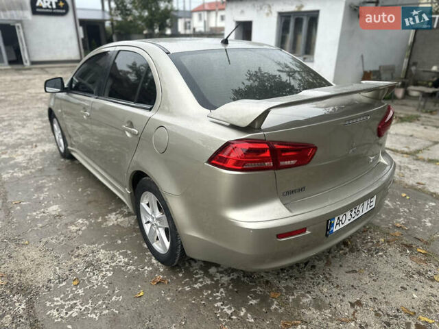 Бежевий Міцубісі Lancer, об'ємом двигуна 2 л та пробігом 312 тис. км за 4700 $, фото 5 на Automoto.ua