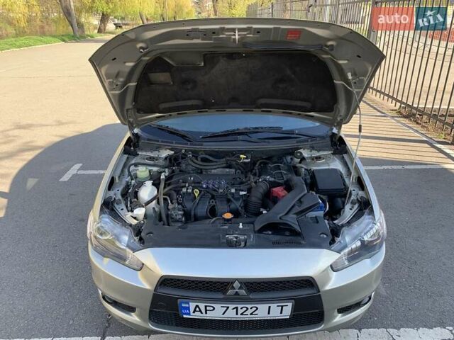 Бежевий Міцубісі Lancer, об'ємом двигуна 2 л та пробігом 175 тис. км за 7650 $, фото 43 на Automoto.ua