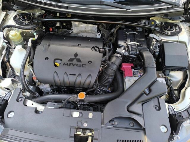 Бежевый Мицубиси Лансер, объемом двигателя 2 л и пробегом 100 тыс. км за 8000 $, фото 5 на Automoto.ua