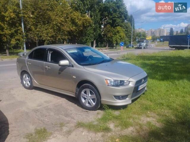 Бежевий Міцубісі Lancer, об'ємом двигуна 2 л та пробігом 100 тис. км за 8000 $, фото 1 на Automoto.ua